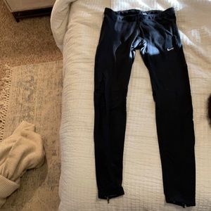 NIKE running leggings with zip ankles